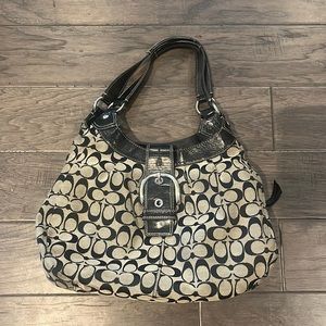 Coach Purse. Fabric with Signature pattern.